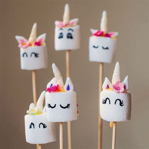 Roll out fondant into small sausage shapes and taper one end. . Unicorn smashmallow